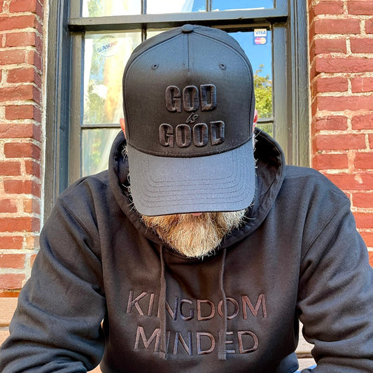 Black hat embroidered with God is Good in black and black Kingdom Minded hoodie