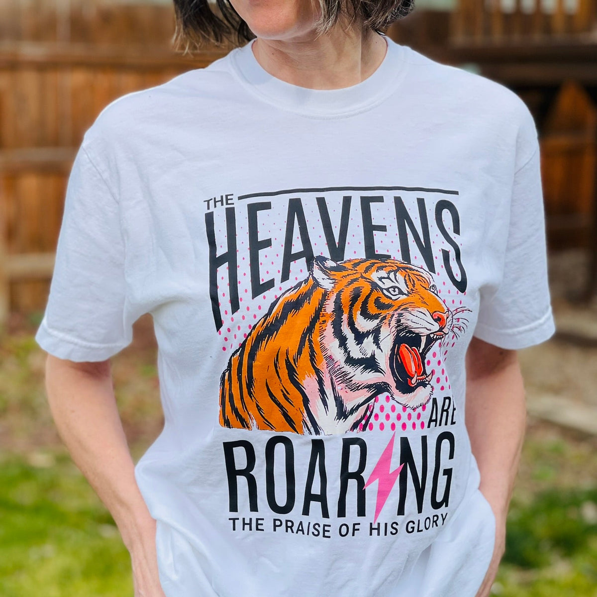 White tee with Heavens are Roaring and tiger printed on front
