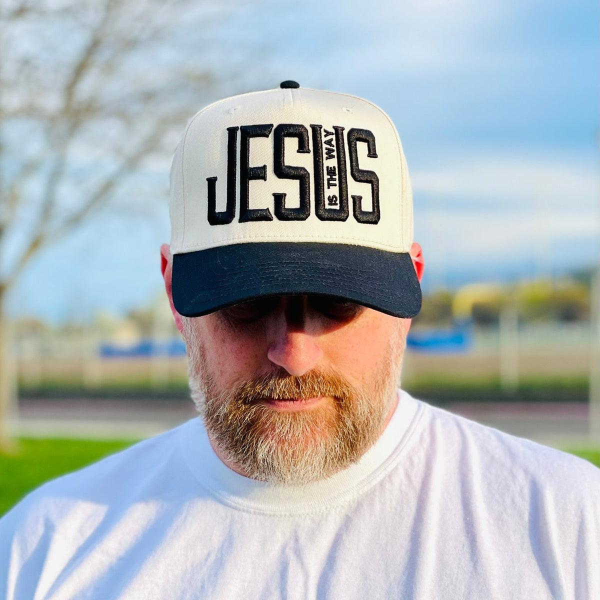 Jesus is the way black trucker hat.